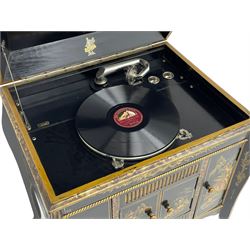 Early 20th century Chinoiserie lacquered gramophone cabinet, the lid decorated with raised gilt work, traditional landscape and figural scenes, fitted with 'Apollo' 'No. 114' gramophone, cupboards below, on cabriole supports