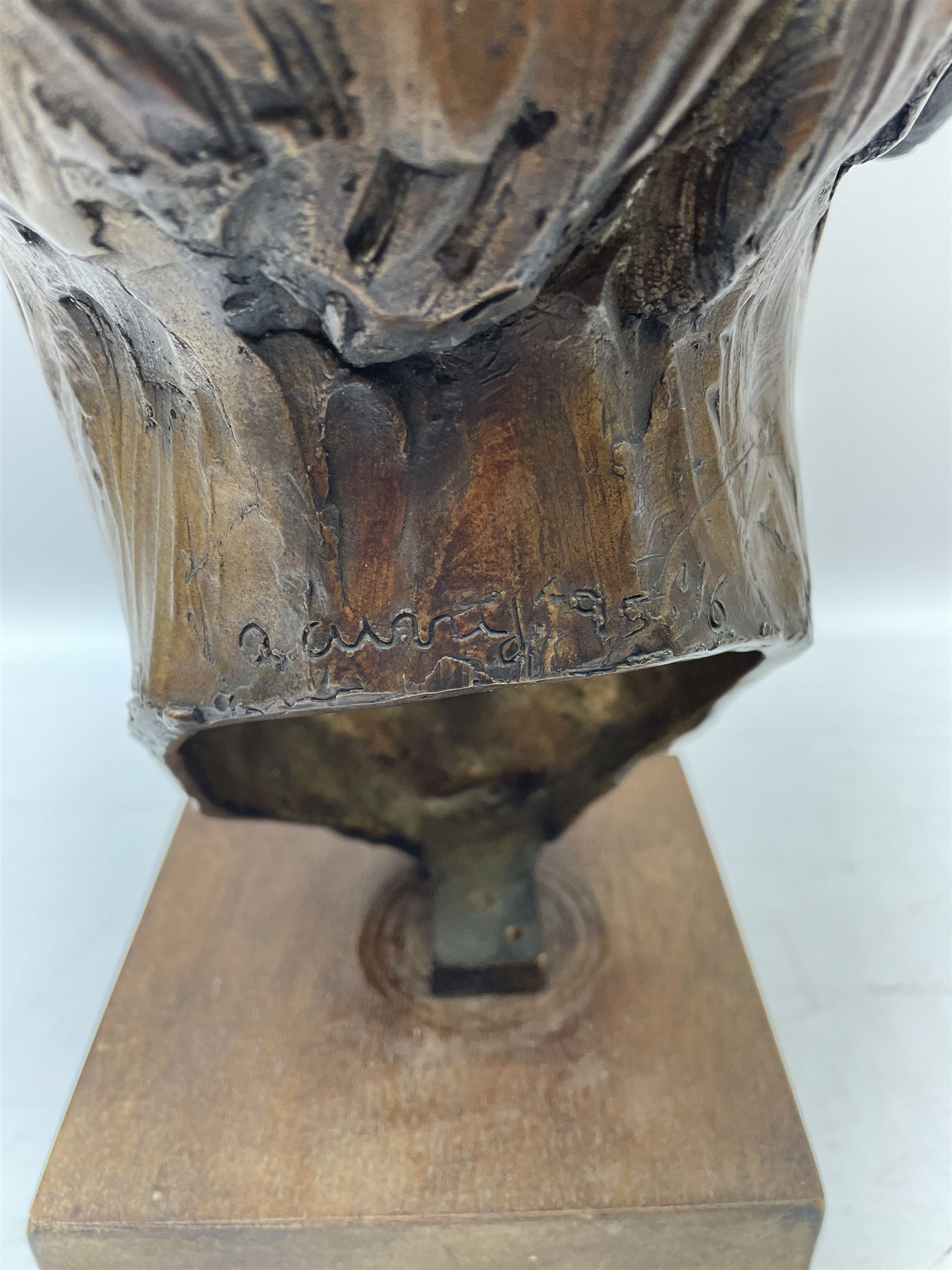 Anne Curry (French 1943-): Bronze bust modelled after the artist's late Grandfather, signed and dated '95 and numbered 1/5 on square wooden plinth, H41cm overall. Provenance: This piece was a gift from the artist's father to the vendors late mother in law. The portrait depicts the artist's late Grandfather who was a friend of the family