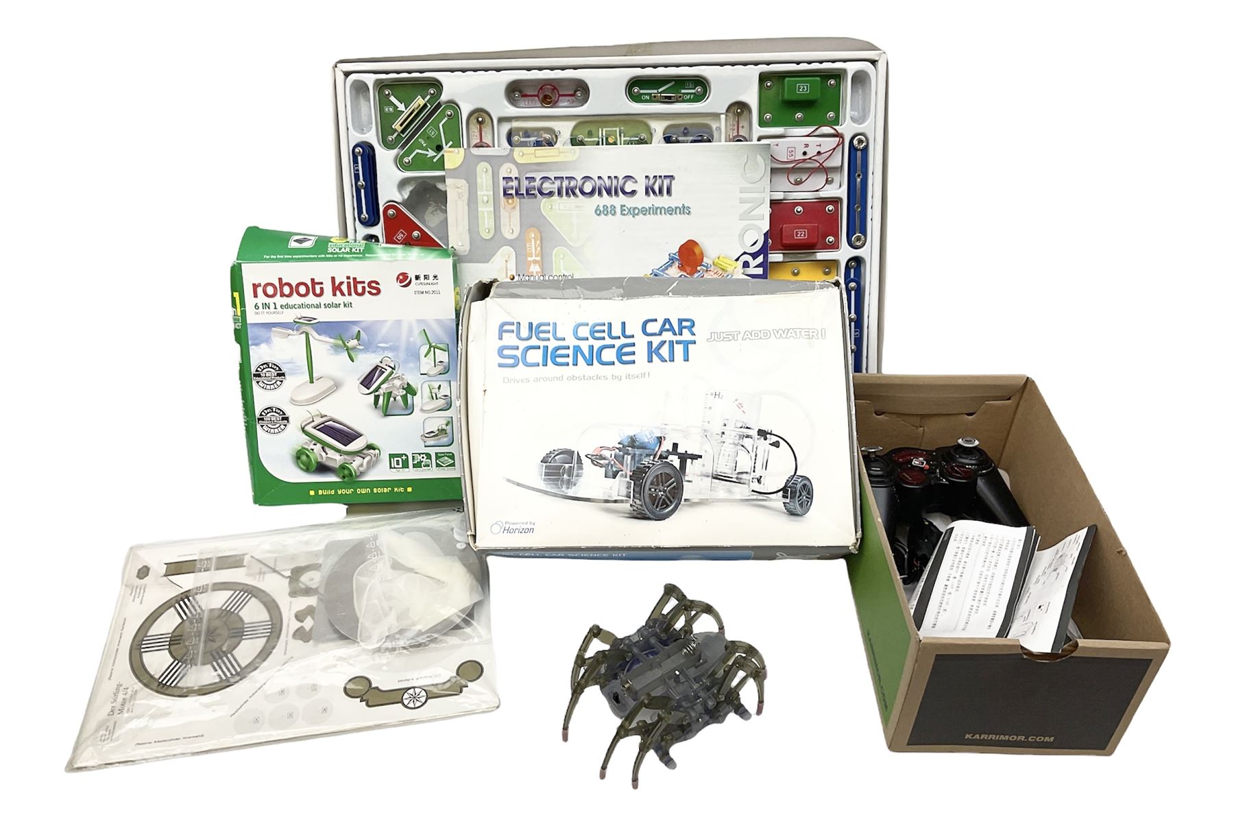 Scientific toys including Electronic Experiment Kit; Fuel Cell Car Science Kit; Robot Kits 6-in-1 Educational Solar Kit; all boxed; remote control helicopter; and two others