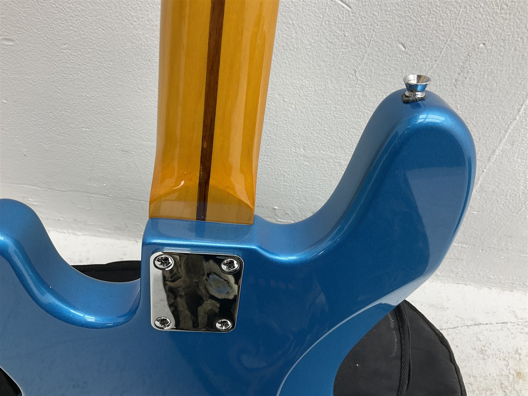 Richwood electric bass guitar in blue, cream and natural finish L117cm; in Fender soft carrying case; together with Behringer Thunderbird Bx108 amplifier date code 0 4 11.