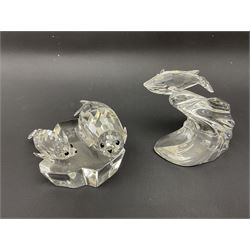 Nineteen Swarovski Crystal sea creatures, to include dolphins, seals, puffer fish, octopus, crabs, together with a quantity Swarovski Crystal shells 