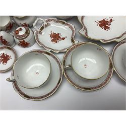 Herend Chinese Bouquet Rose pattern tea service comprising teapot, coffee pot, open sucrier, six cups and saucers, six tea plates, cream jug and stand, milk jug, two teabag holders, preserve pot, two leaf shaped dishes, four egg cups, salt & pepper pots, pair side plates and another plate