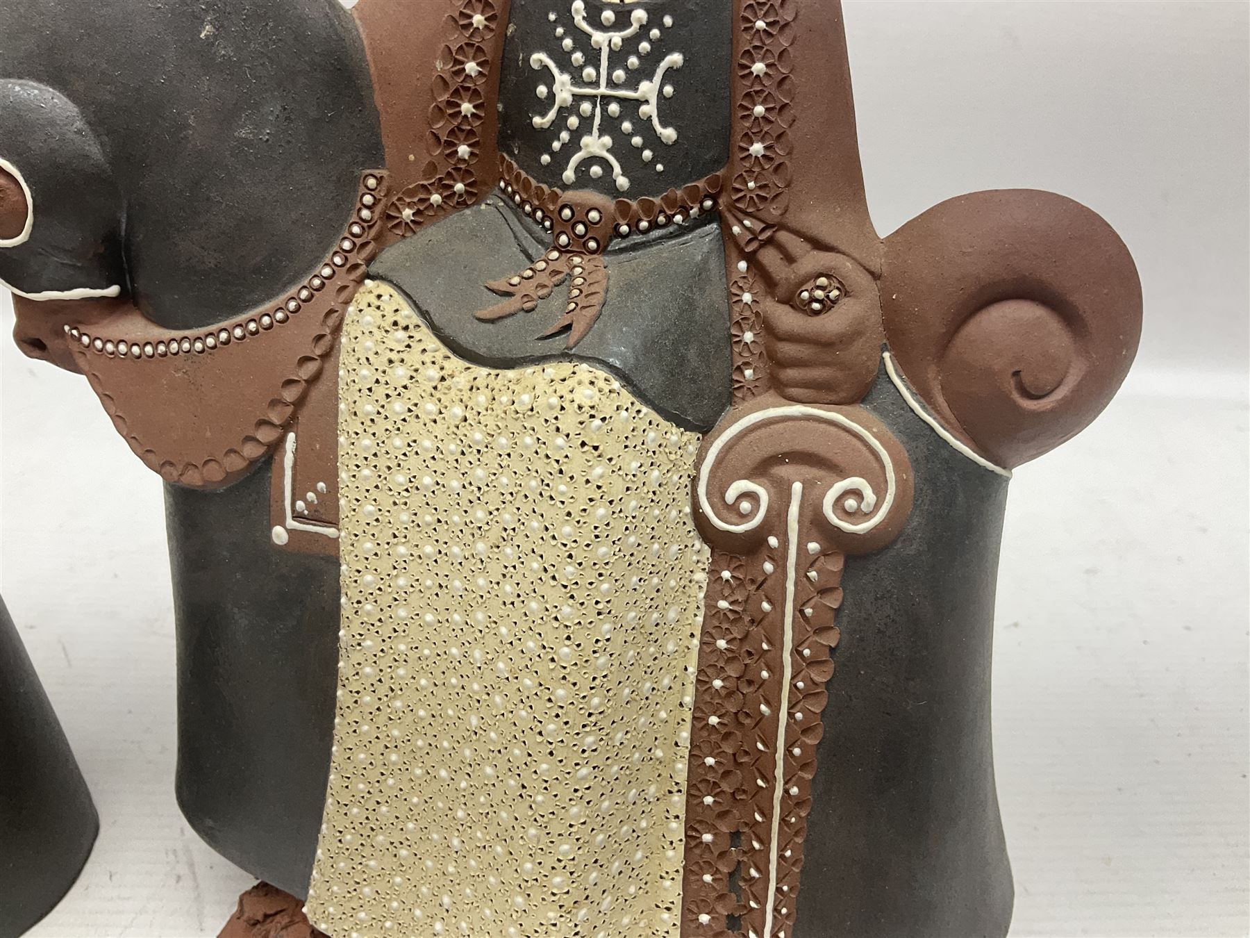 Leonard Stockley; two studio pottery figures modelled as a king and queen upon horses, both signed beneath,  H25cm