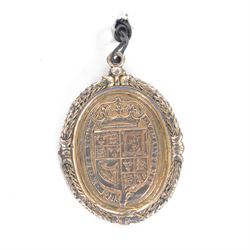 Charles I, silver gilt Royalist Badge, by Thomas Rawlins, Charles I in profile to right, lace collar and doublet, CAROLVS DG MAG BRI FR ET HIB RX, the reverse crowned shield of Royal arms, wreath border around to both sides, H5.2cm