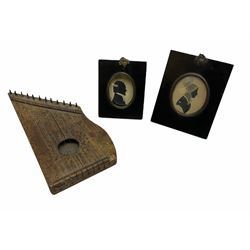 Two framed miniature portrait silhouettes, together with a miniature zither, in one box 