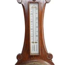 Aneroid barometer and thermometer in carved oak case