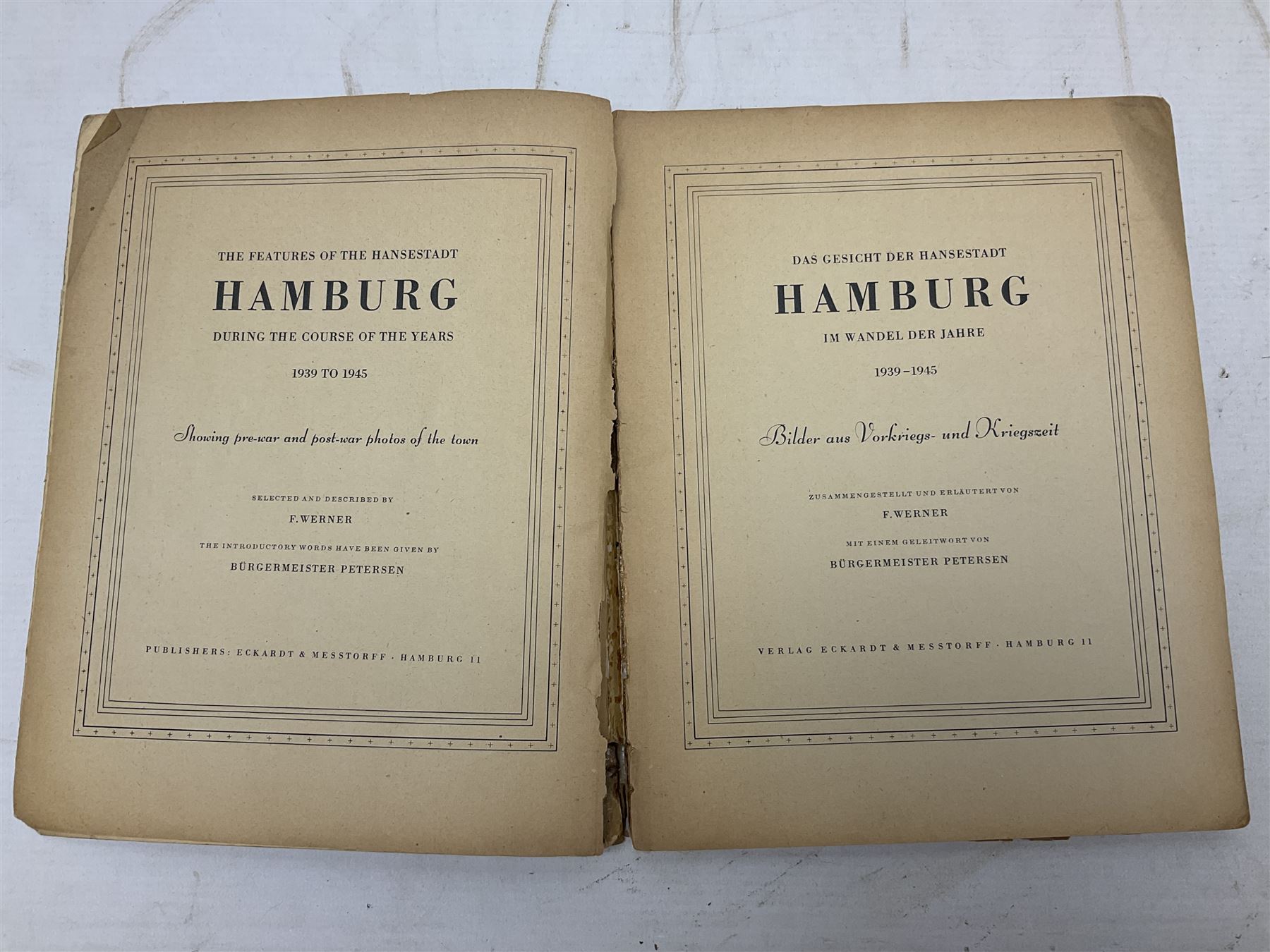 Adolf Hitler, Bilder aus dem Leben des Fuhrers [Pictures from the Life of the Fuhrer], Herausgegeben vom Cigaretten / Bilderdienst, Hamburg / Bahrenfeld, 1936, an album of two hundred tipped-in cards bearing photographs by Heinrich Hoffman, originally collected with cigarettes, 31 cm x 24 cm; together with a Waffen-SS book 'Wenn alle Bruder schweigen'; Hamburg 1939-1945; and two other booklets