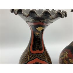 Pair of Japanese baluster form vases, with tapering necks and frilled rims, decorated with shaped panels of birds and blossoming flowers in gold, red and black, H30.5cm