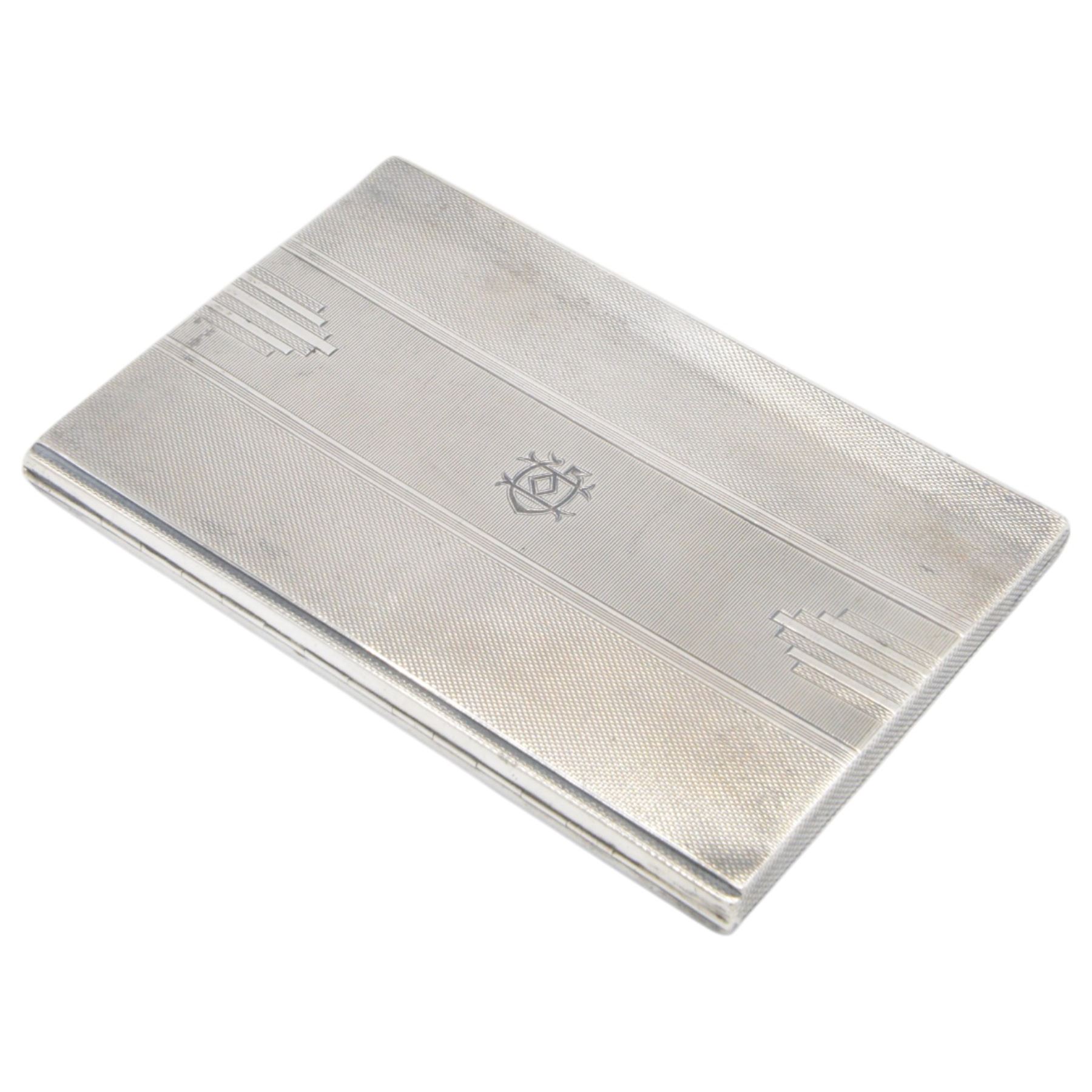 1930s silver cigarette case, of rectangular form, with engine turned decoration, with engraved initials to the centre, hallmarked Walker & Hall, Sheffield, 1937, L13cm