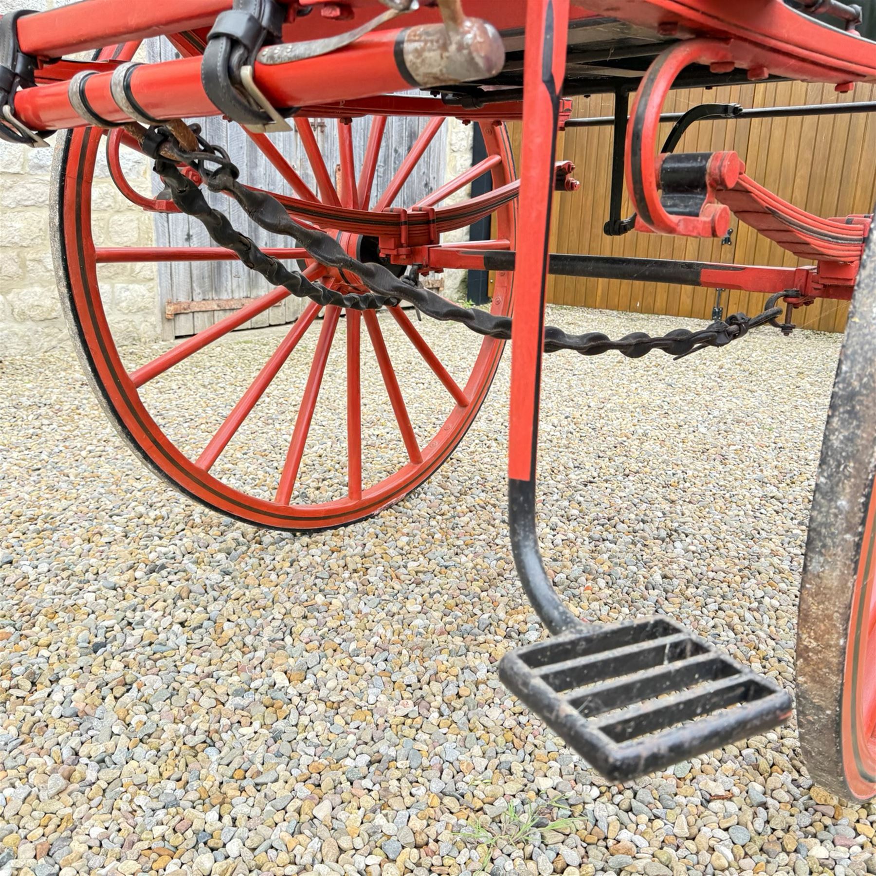 Holland & Holland Tandem Cart - Althorp Spencer Family Estate

A two wheeled tandem cart or cocking cart by Holland & Holland Coach Builders, London, with black painted bodywork, red painted shafts and running gear, red wooden spoked wheels with rubber tyres, green upholstered seating and a rear perforated metal footboard. The cart is fitted with carriage lamp brackets (lamps next lot), green buttoned cushions with leather retaining straps, side louvered body panels, footrests, leaf spring suspension and shafts for horse use. The carriage incorporates an adjustable body position, operated by a lever, allowing the body to be moved forwards or backwards to alter the weight distribution. Formerly owned by the family of Lady Diana Spencer,
Sympathetically conserved by Woods of Fairbourne Carriages Ltd, Kent.

Features:
• Brass maker’s plaque for Holland & Holland Coach Builders, London
• Two wheeled tandem cart
• Black painted body with red painted shafts and running gear
• Red wooden spoked wheels with rubber tyres
• Green upholstered cushions with leather retaining straps
• Adjustable carriage body for weight distribution
• Lever operated adjustment mechanism
• Perforated rear footboard
• Side footrests
• Louvered side panels
• Leaf spring suspension
• Rear opening storage compartment
• Decorative painted armorial motif to rear panel
• Fitted carriage lamps shown, not included in the lot (available as next lot)
• Conserved by Fairbourne Carriages Ltd
• Provenance: The Althorp Attic Sale including The Spencer Carriages, lot 195, 7 July 2010

Dimensions:
Overall length 396 / 198cm
Width 155cm
Height 190cm

Wheel Diameters:
Wheels: 148cm

Seating:
Driving seats: 2
Passenger seats: 2