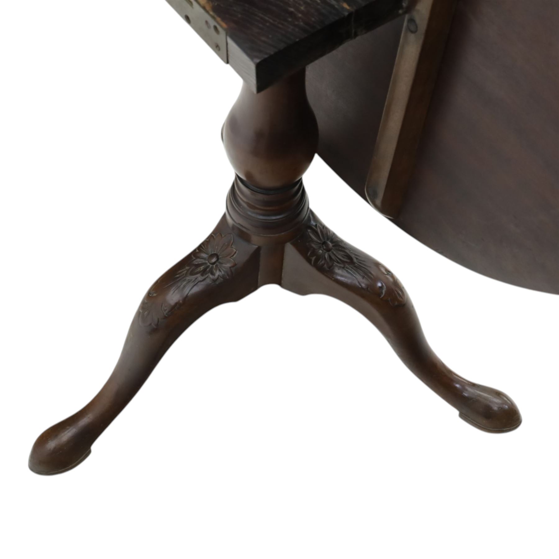 19th century quality mahogany tripod table, the circular tilt top supported on a turned baluster column with downswept cabriole legs carved with flower heads and terminating in pad feet