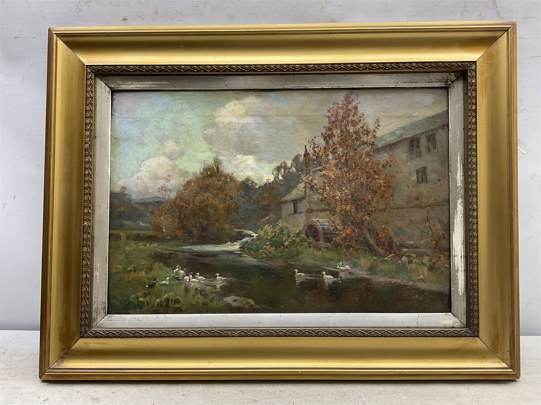 English School (19th century): Ducks by the Mill, oil on canvas, indistinctly signed and titled verso 30cm x 45cm