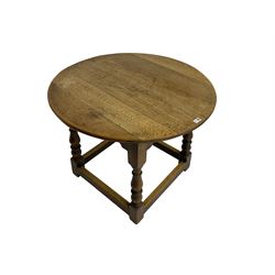17th century design oak joint table, circular top over shaped frieze rails, turned supports joined by plain stretchers