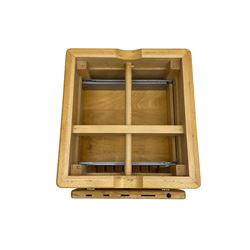 Beech butcher block kitchen cart, featuring square butcher block top, side drop-leaf extension, single drawer with metal sides, and two slatted shelves below, the cart supported by four castors