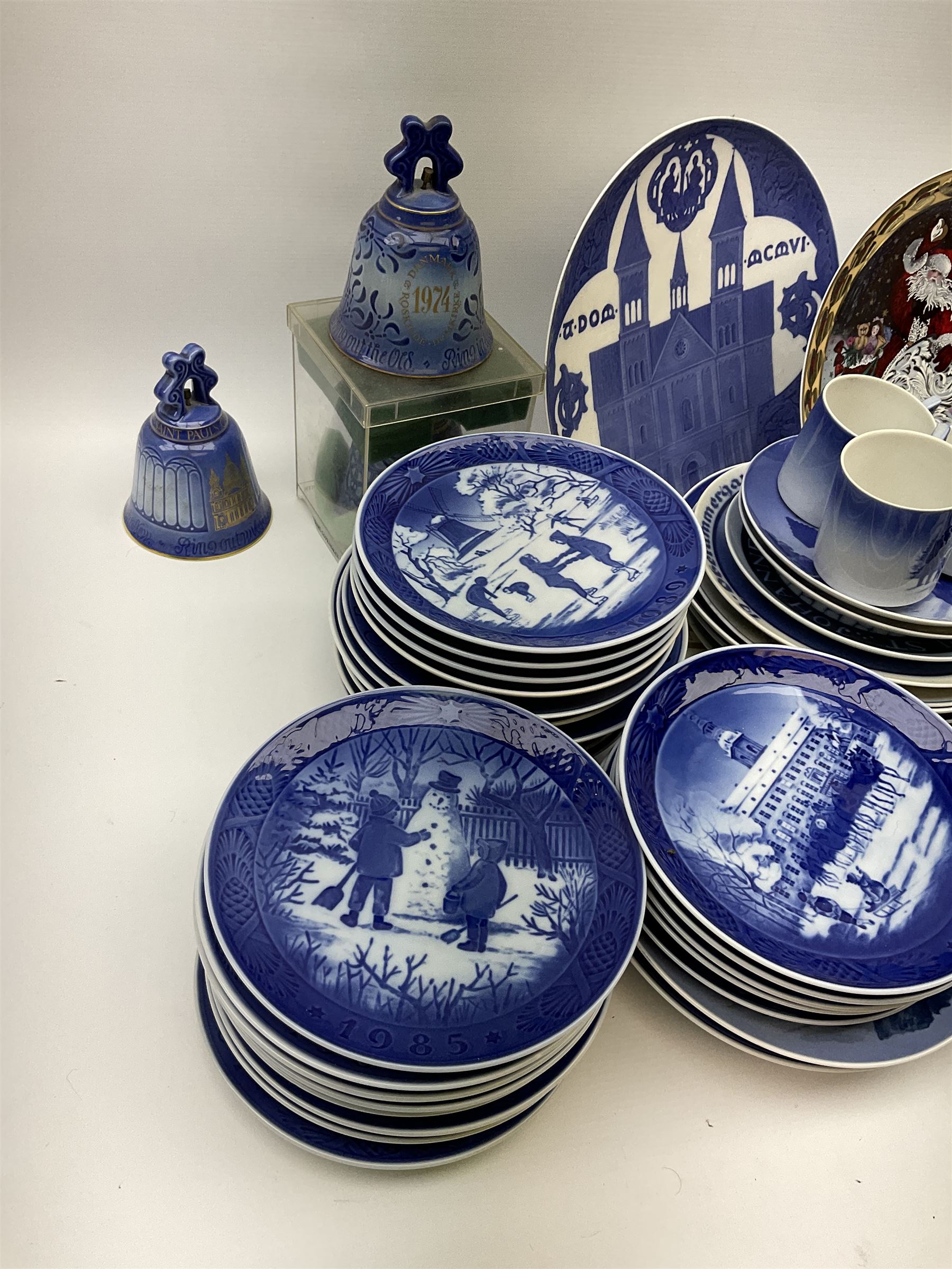 Royal Copenhagen thirty-eight assorted Christmas calendar plates, from 1963 to 1992, a selection of other Royal Copenhagen decorative plates, a collection of Bing and Grondahl plates, ceramic bells, etc. 