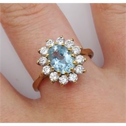 9ct gold oval blue topaz and cubic zirconia cluster ring, hallmarked 