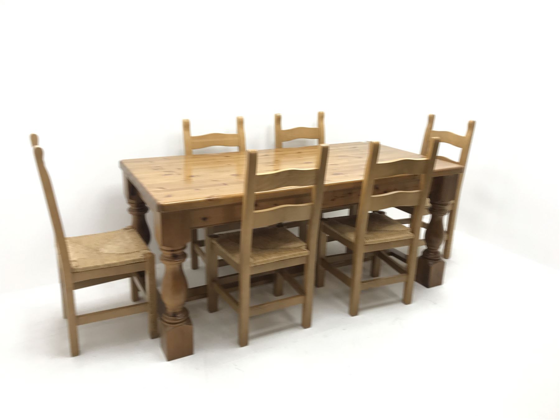 Solid pine rectangular dining table, baluster supports joined by