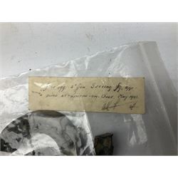 Small collection of WW2 shrapnel and German and British shell parts, most with manuscript details of where and when found including London, Leeds, Bristol, Linton-on-Ouse etc