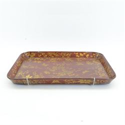 Early 19th century red lacquered papier-mâché tray by Clay of King Street Covent Garden, of rounded rectangular form, painted in gilt with large foliate sprays and butterflies, impressed verso CLAY KING ST COVENT GARDEN, W66.5cm D48.5cm