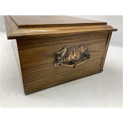 Early 20th century Art Nouveau oak canteen of rectangular form, the hinged top with central inlaid brass cartouche engraved with North Eastern Railway Company interest, 1917, with hinged lift up lid revealing fitted interior, above two drawers, with twin handles, L47cm H19cm D32cm
with key 