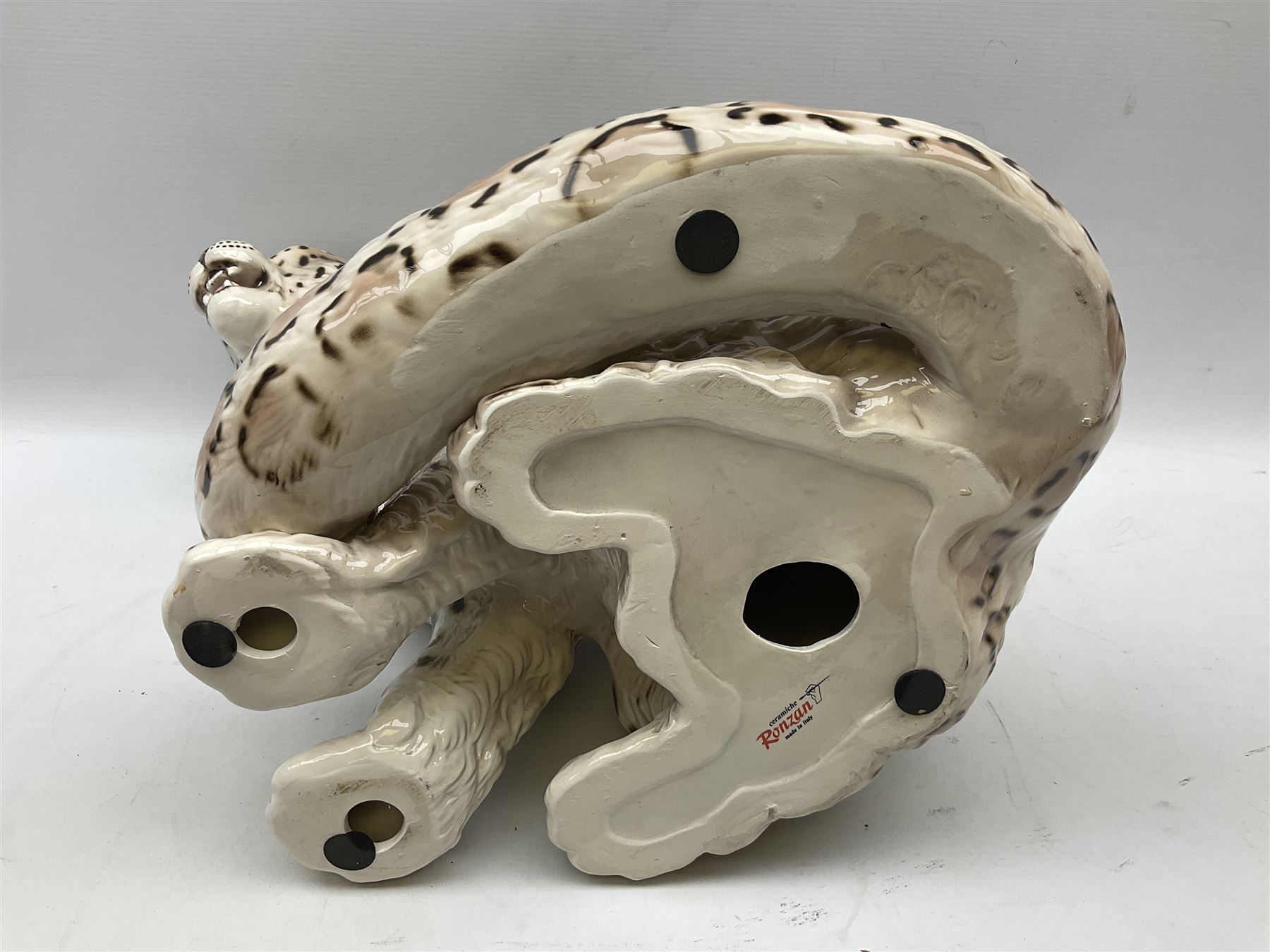 Ronzan fireside model of a snow leopard, with printed mark beneath, H38cm 