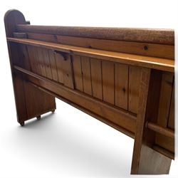 Early 20th century stained pine ecclesiastical church pew, the shaped end supports flanking slatted and panelled back, with black stencilled number '16' to the side