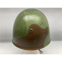 1960s Italian parachutist helmet with liner; camouflage paintwork with parachutist crest to the front