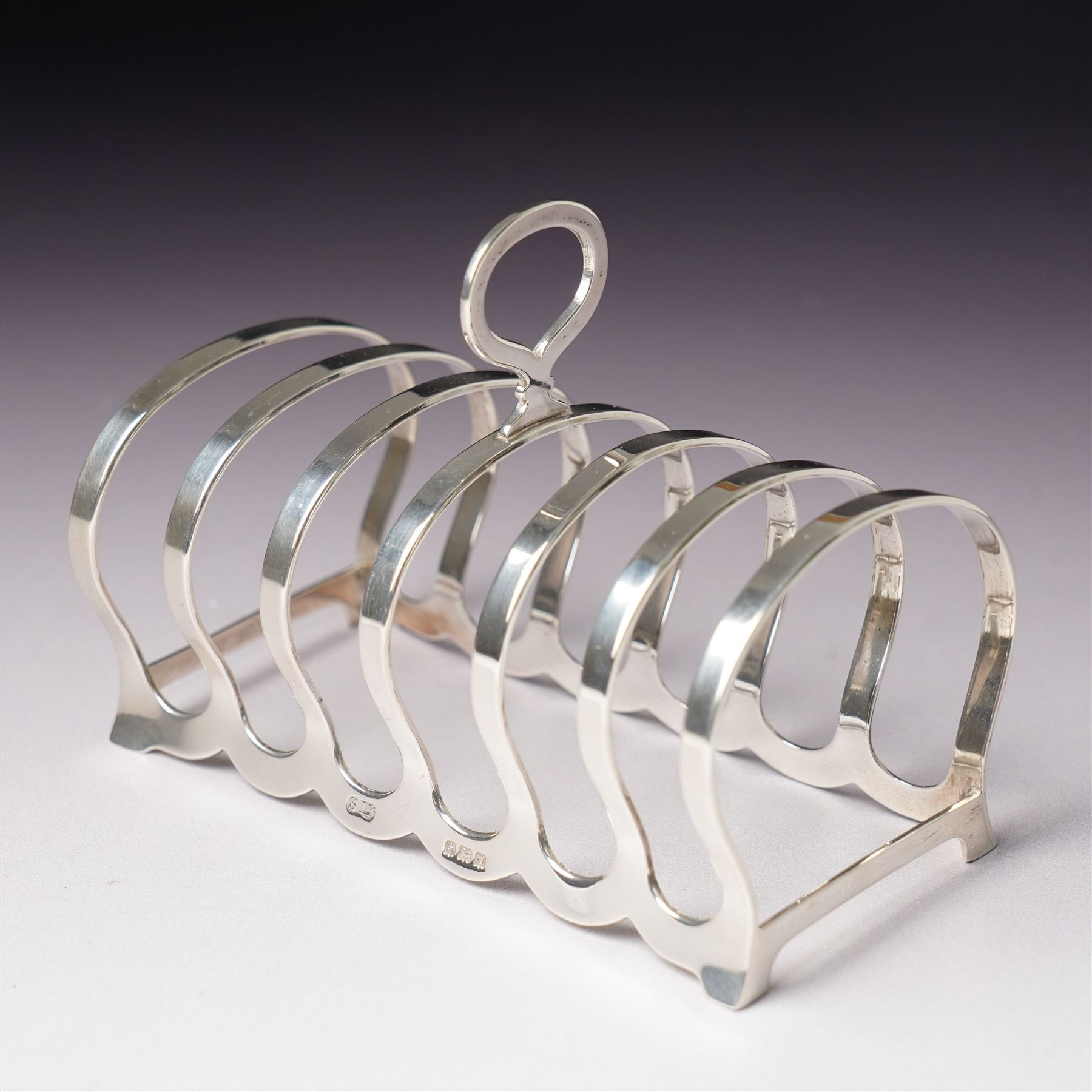 Silver six division toast rack with loop handle Birmingham 1933 Maker William Suckling Ltd