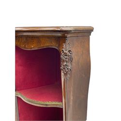 19th century rosewood buffet credenza, bombe form with shaped and moulded top, two central glazed doors with foliate moulded gilt slips, the red fabric-lined interior fitted with a single shelf, flanked by open shelves with raised gilt metal lips, the uprights decorated with shell and flower head carved cartouche mounts, acanthus leaf scroll carved lower mounts, on shaped and moulded plinth base 