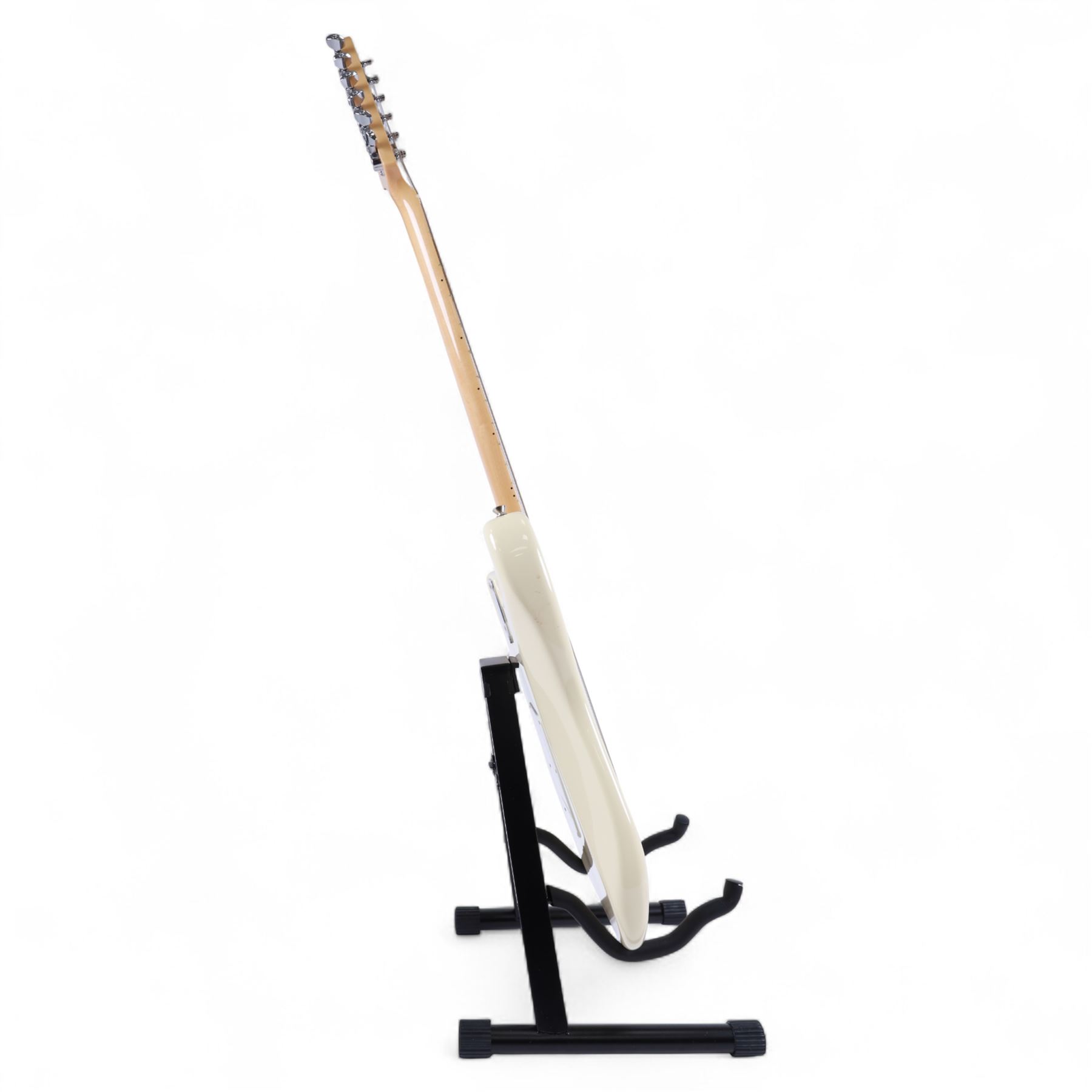 Fender Stratocaster electric guitar, serial no. P093223 made in Japan c.1993, with cream body, white scratch plate, maple neck, three pickups, three control dials and five way selector switch, in a black Fender USA hardcase, guitar L99cm