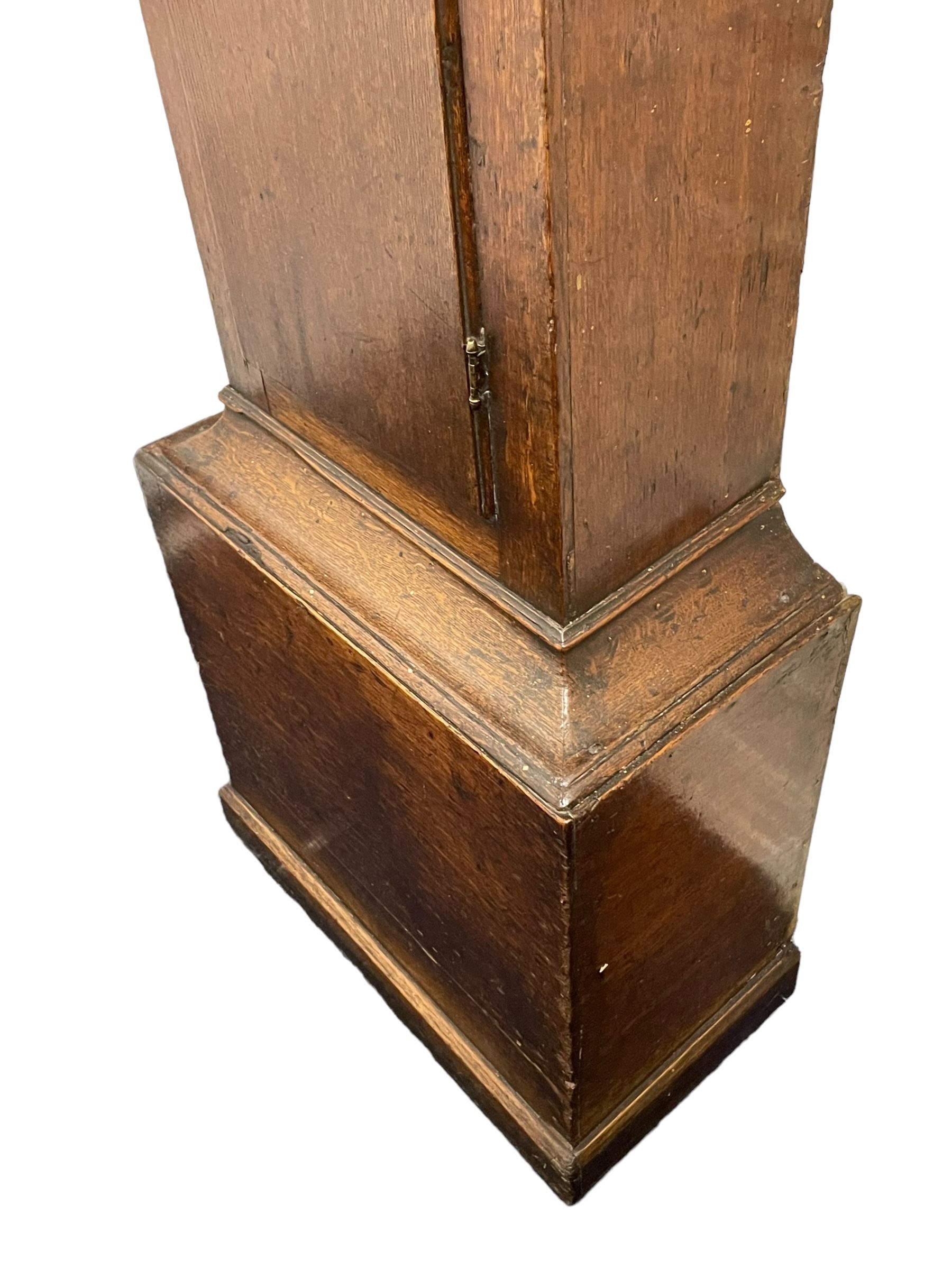 Gilbert Kidd of Malton (North Yorkshire) - late 18th century oak 8-day longcase clock c1780,  with a tall double caddy top and later brass ball and spire finials, break arch hood door beneath with attached pilasters and wooden capitals,  plain trunk with a long flat topped door, raised on a square plinth with applied skirting,  brass break arch dial with the makers name to the silvered boss in the break arch, engraved and silvered dial centre and chapter ring, with cast spandrels and matching steel hands, subsidiary seconds dial and square calendar aperture, dial pinned directly to a rack striking movement with a recoil anchor escapement, sounding the hours on a cast bell. With pendulum and weights.
The Kidd family were a prolific family of provincial clockmakers working in Malton from the mid 18th century until the early 19th century. Many of their clocks are simply signed 