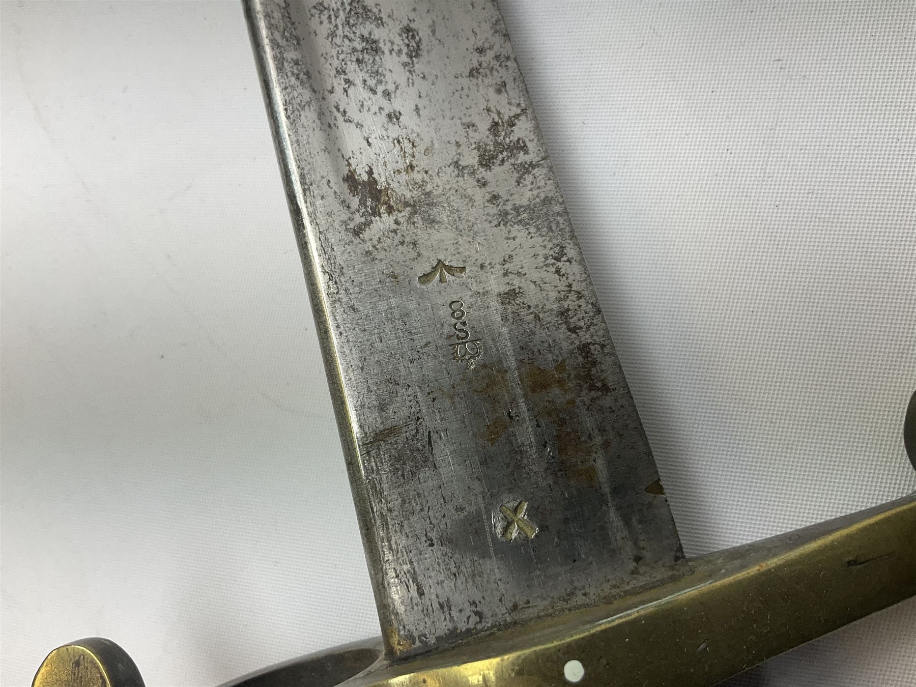 British 1855 pattern 'Sappers & Miners' Lancaster sword bayonet as issued to Medical Corps, the 62cm steel blade marked S&K with various numbers; in brass mounted leather scabbard numbered 1176