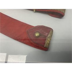 Victorian / Edward VII Queens Own Hussars Officers Full Dress Pouch and Cross Belt; scarlet cloth covered leather pouch with bullion embroidered crown, laurel bordered regimental crest within an edge of embroidered bullion wire; with its original officers cross belt with fine regimental pattern brocade to the top and gilt metal furniture; displayed in a wall hanging case with cloth and metal regimental badges; mahogany stained frame 44 x 54cm