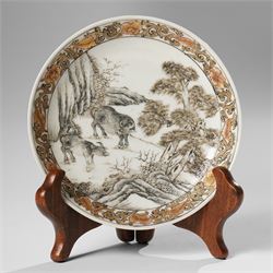 Chinese Yongzheng period saucer, finely painted in grisaille with buffalo within a rocky l...
