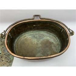 Victorian seamed copper fish kettle, of typical form with iron swing handle, the cover opening to reveal a tin lined interior and twin handled pierced strainer, not including swing handle L48cm, including handle to cover H30cm