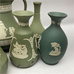 Collection of  Wedgwood green Jasperware, to include large jug, vases, trinket dishes, etc together with two teal Jasperware vases 