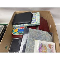 Large collection of postcards and greetings cards, all housed in albums, together with first day covers, other stamps and viewmaster slides etc, in five boxes 