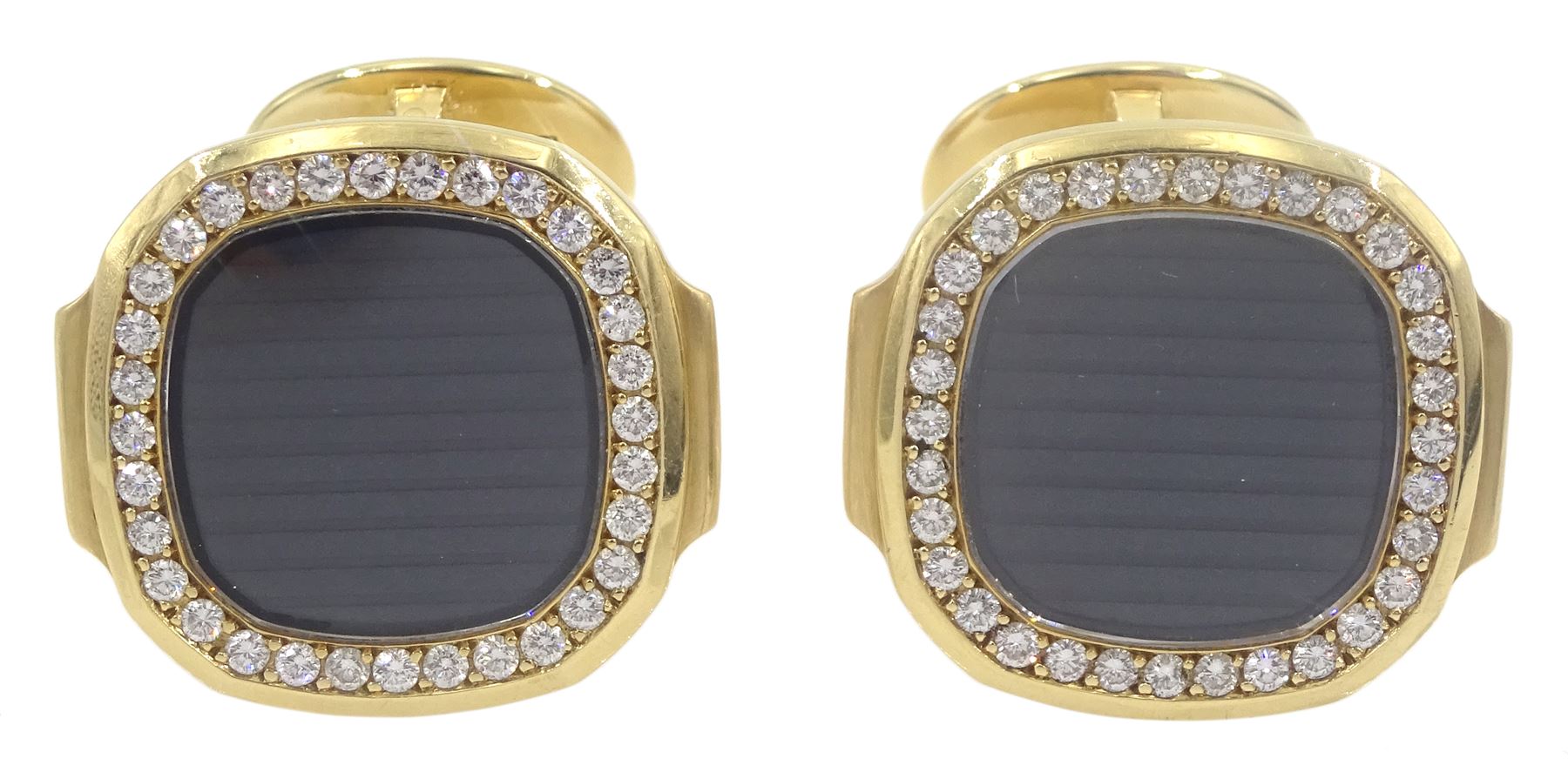 Pair of Patek Philippe Nautilus 18ct yellow gold and diamond cufflinks, with sapphire crystal, black-grey centre and diamond-set front, hallmarked, in original box