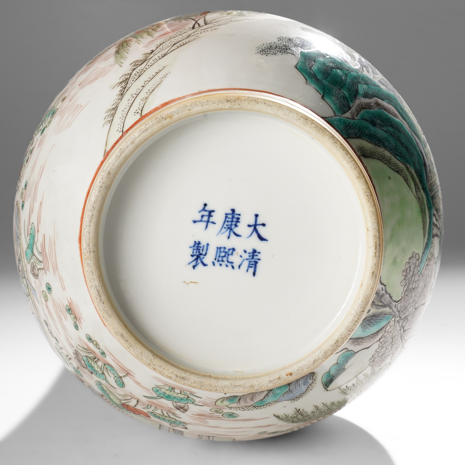 Chinese Kangxi period famille verte vase, the body finely painted with a continuous narrative scene of figures inside and out of a pavilion complex, beside a river, rocks and trees, character mark to base, raised upon a hardwood stand, overall H47cm