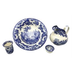 Mintons Genevese pattern wash bowl, jug and toothbrush holder, together with a similar Mintons blue and white soap dish, all decorated in the oriental style, all with printed marks beneath, largest D32cm