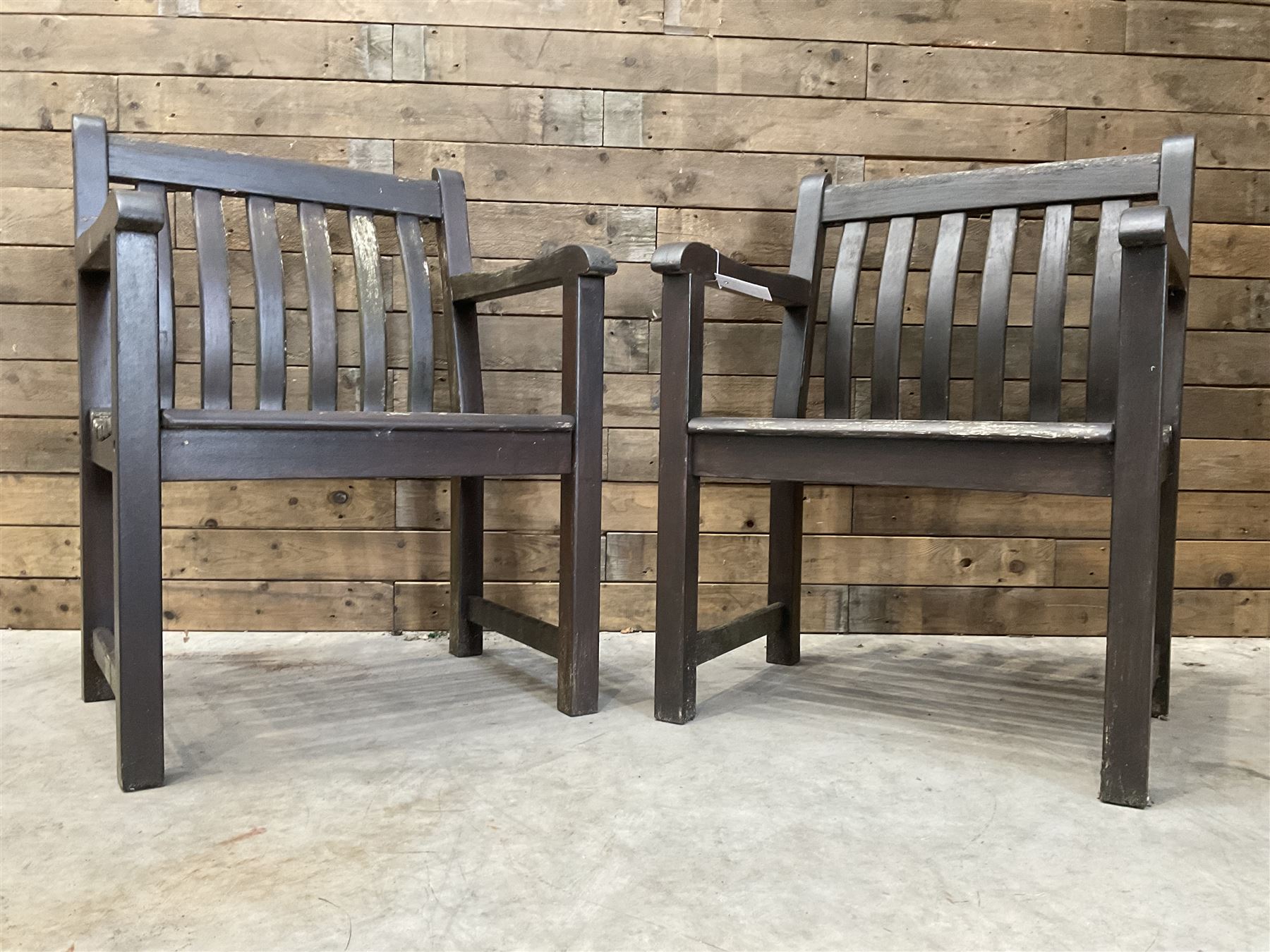 Pair of small stained hardwood garden benches