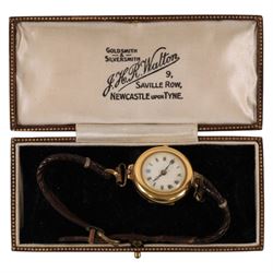 Early 20th century 18ct gold manual wind wristwatch, London 1920, on leather strap