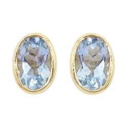 Pair of 9ct gold single stone oval aquamarine stud earrings