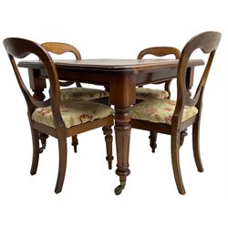 Victorian mahogany dining table, telescopic extending action, moulded rectangular top with rounded corners, single additional leaf, on turned and fluted supports with brass and ceramic castors; and a set of four Victorian mahogany dining chairs, balloon back over upholstered drop-on seat in floral pattern fabric, on turned front supports 