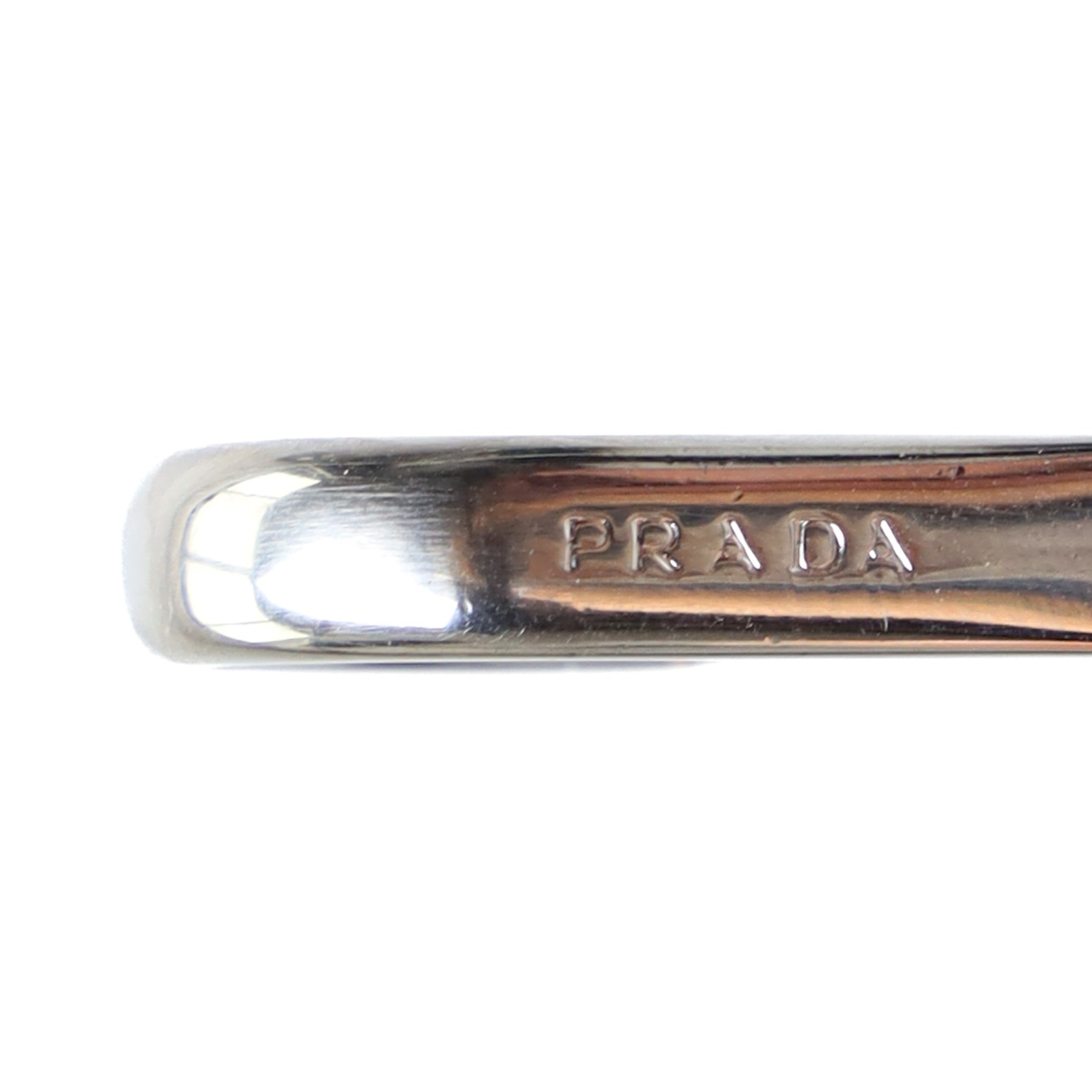 Prada - ‘Robot’ keyring and bag charm, in silver Saffiano leather and metal with studded detailing, articulated chain limbs and black bead hands, with split ring and lobster clasp, with original box
