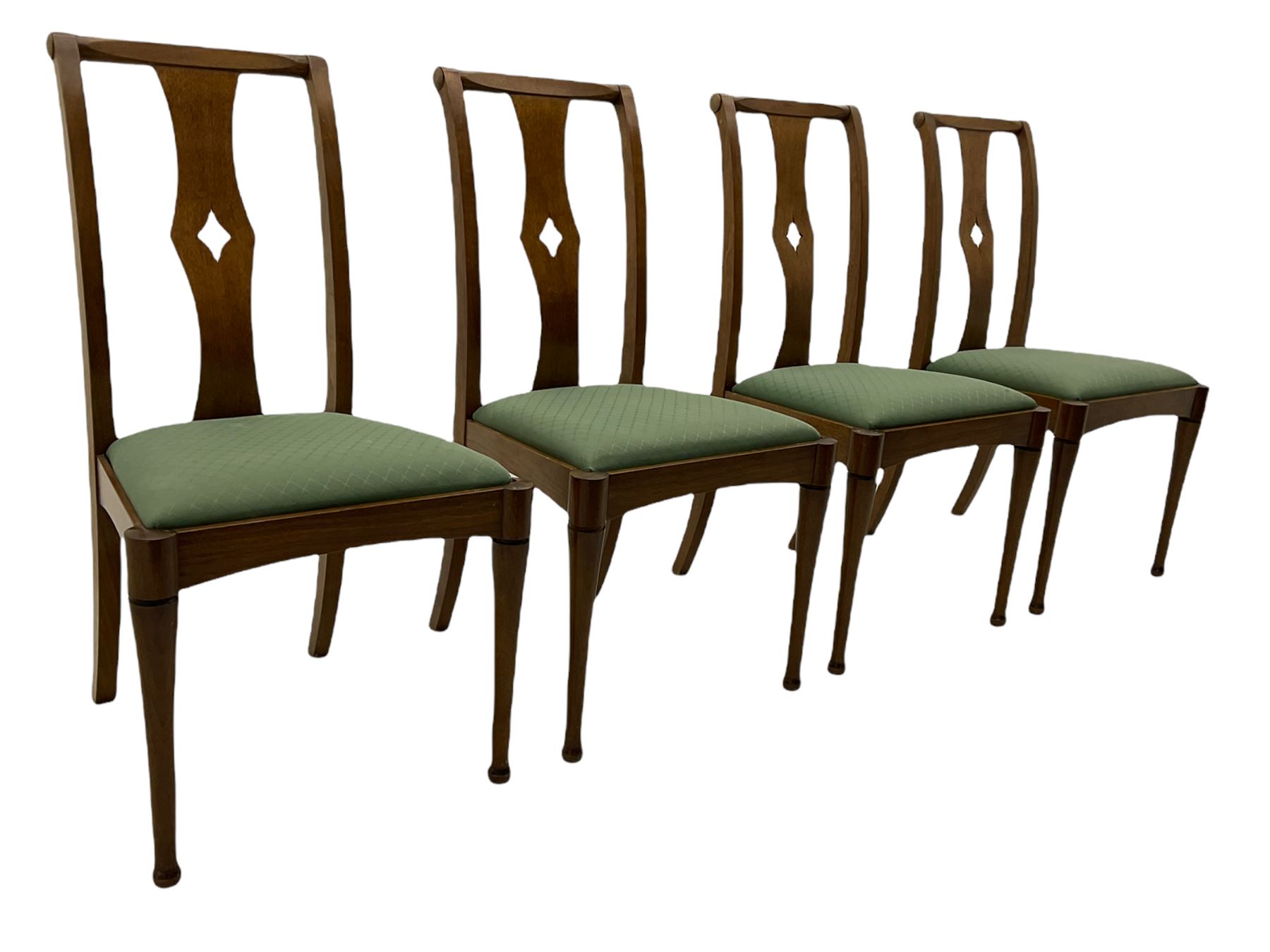 Set of eight contemporary walnut dining chairs, curved backs set with shaped splats with pierced detail, drop in upholstered seat cushions, on turned supports 