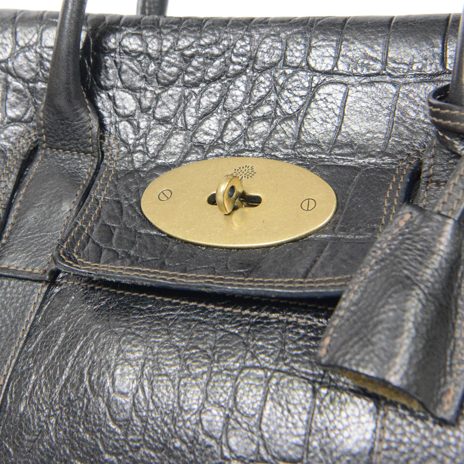 Mulberry Bayswater handbag, black mock crocodile-embossed leather with rolled leather top handles and brass hardware, the front secured by an oval Postman’s Lock stamped with the Mulberry tree motif, the interior lined in tan suede with zip pocket and slip compartments, leather brand tab stamped Mulberry, together with original Mulberry dust bag, W36cm D16cm H26cm