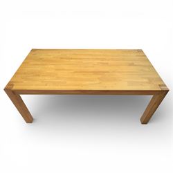 Solid light oak extending dining table with single leaf, and set of six chairs