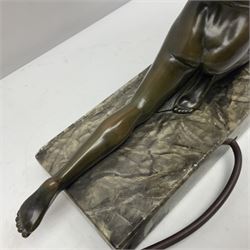 1930s Art Deco spelter table lamp, modelled as a nude woman holding aloft a spherical crizzled glass shade, upon a marble base, H48cm