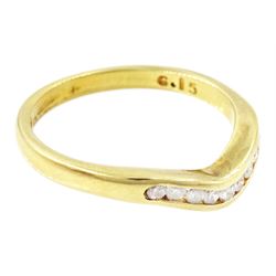 18ct gold diamond wishbone ring, channel set with nine round brilliant cut diamonds, Birmingham 1994, total diamond weight 0.15 carat